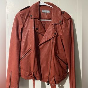 Faux leather jacket. Burnt orange. Size medium. Worn once.